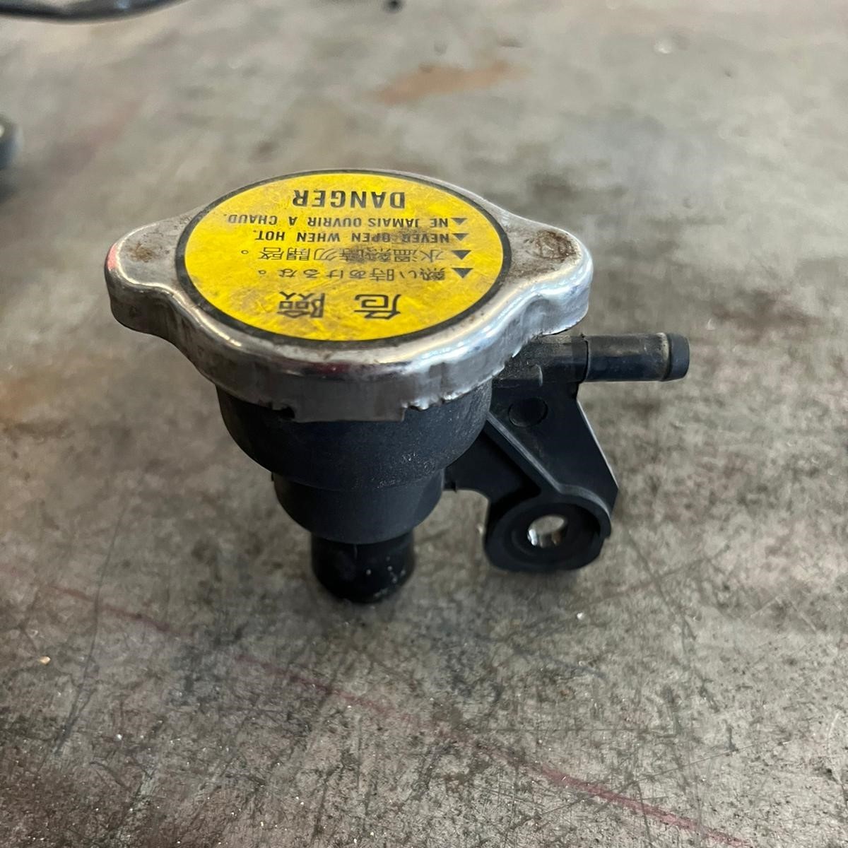 Tapón del radiador Kymco Xciting 500 ABS 2009