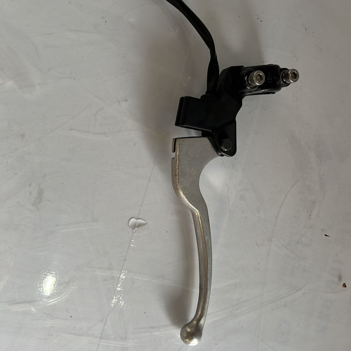 Soporte y maneta de freno trasero Sym Jet 14 49cc 2021