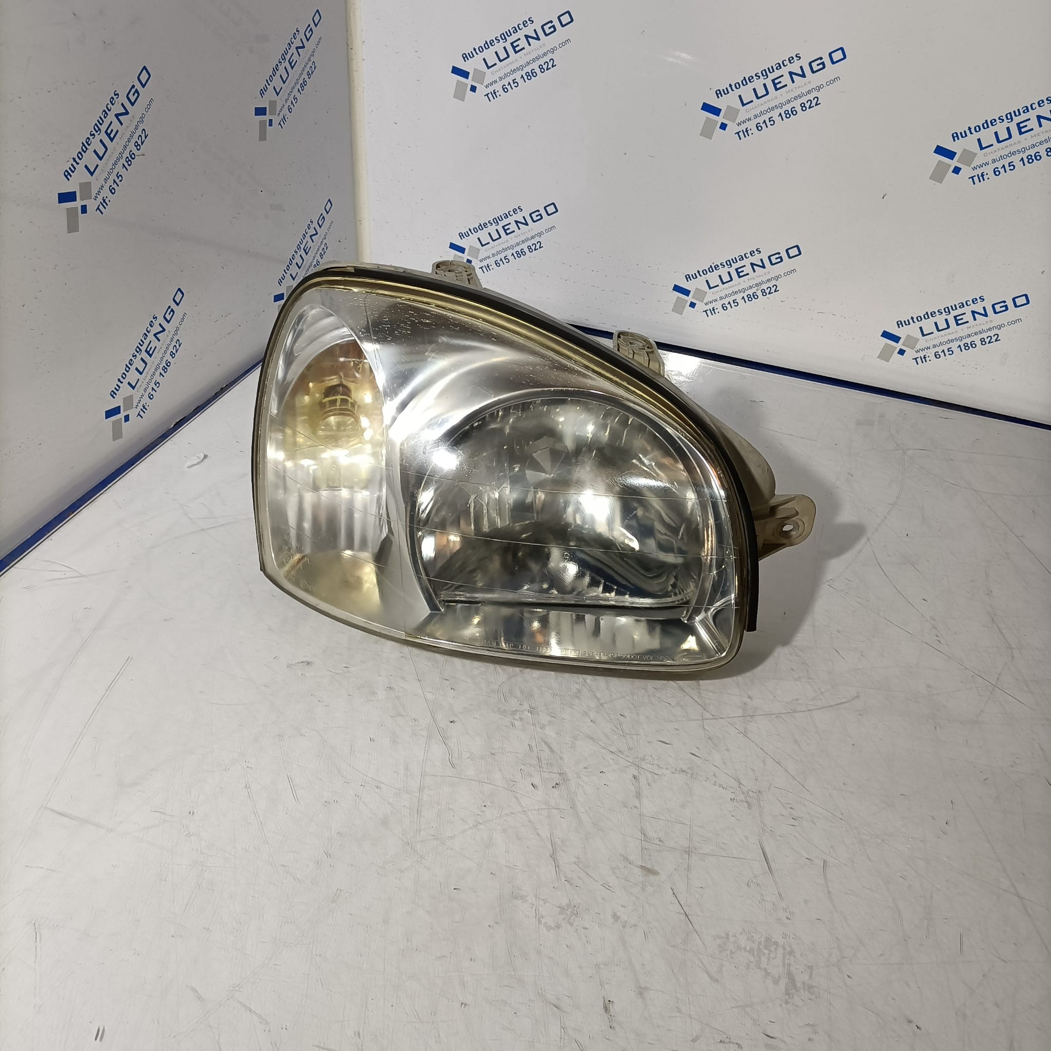 Faro delantero derecho Hyundai Santa Fe 2001