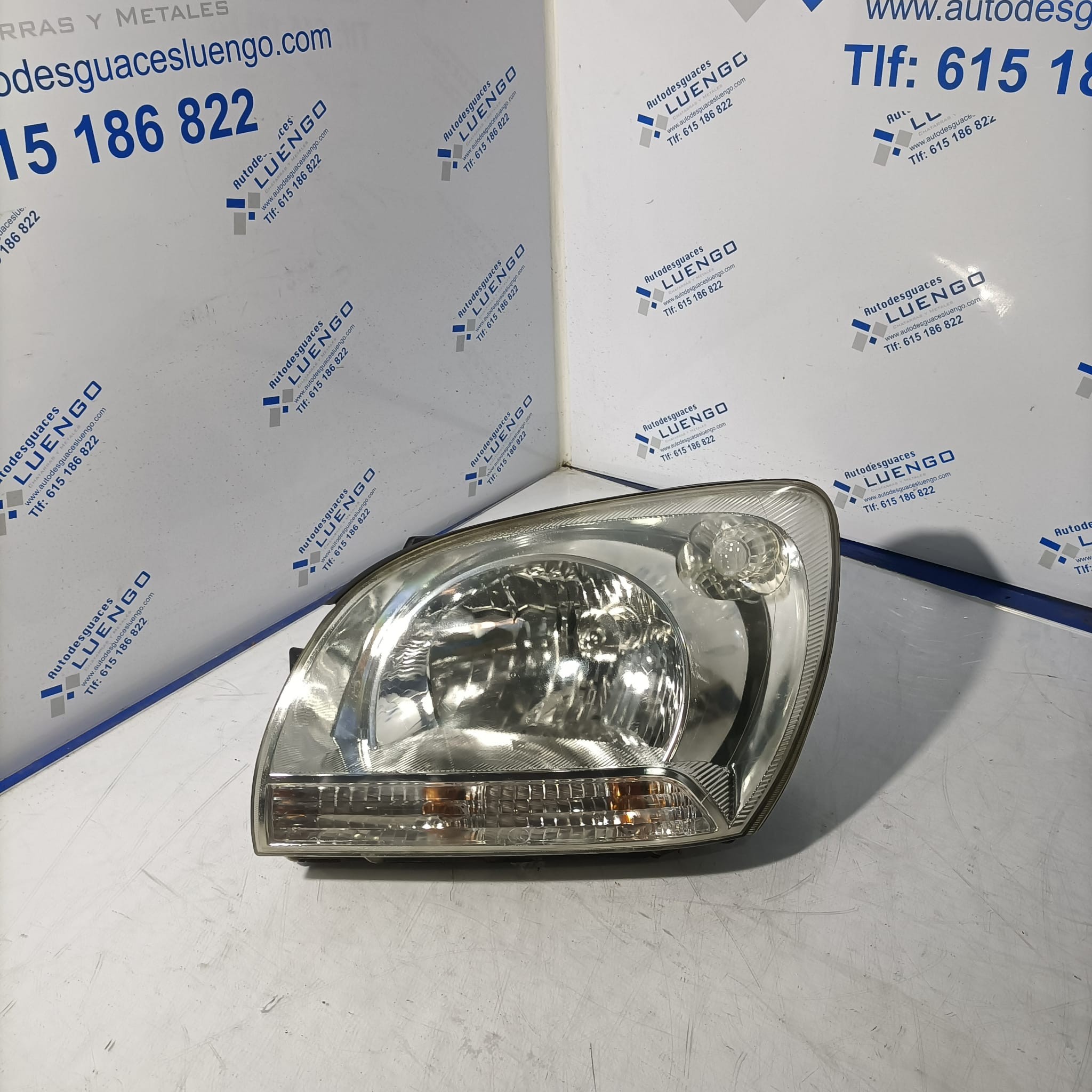 Faro delantero izquierdo Kia Sportage 2007