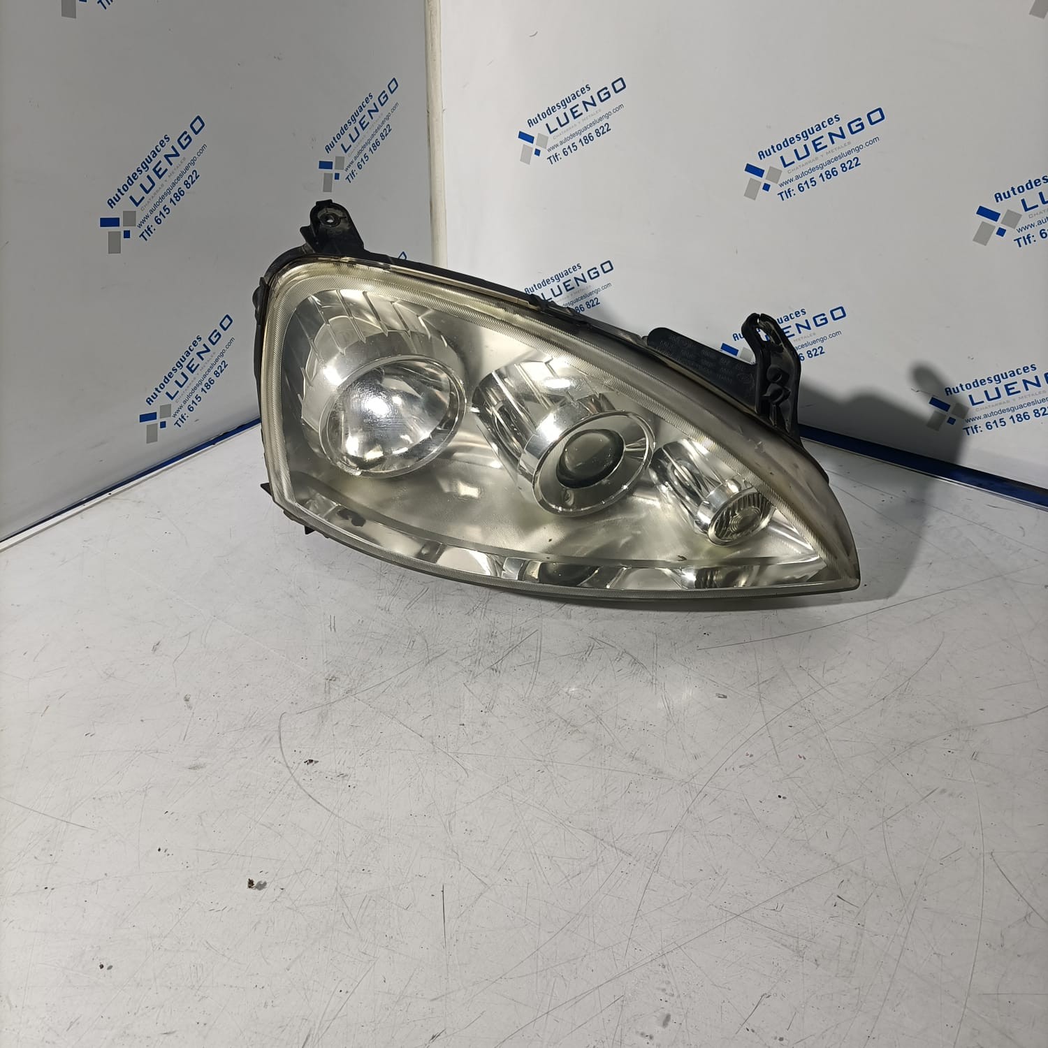 Faro delantero derecho Opel Corsa 2003