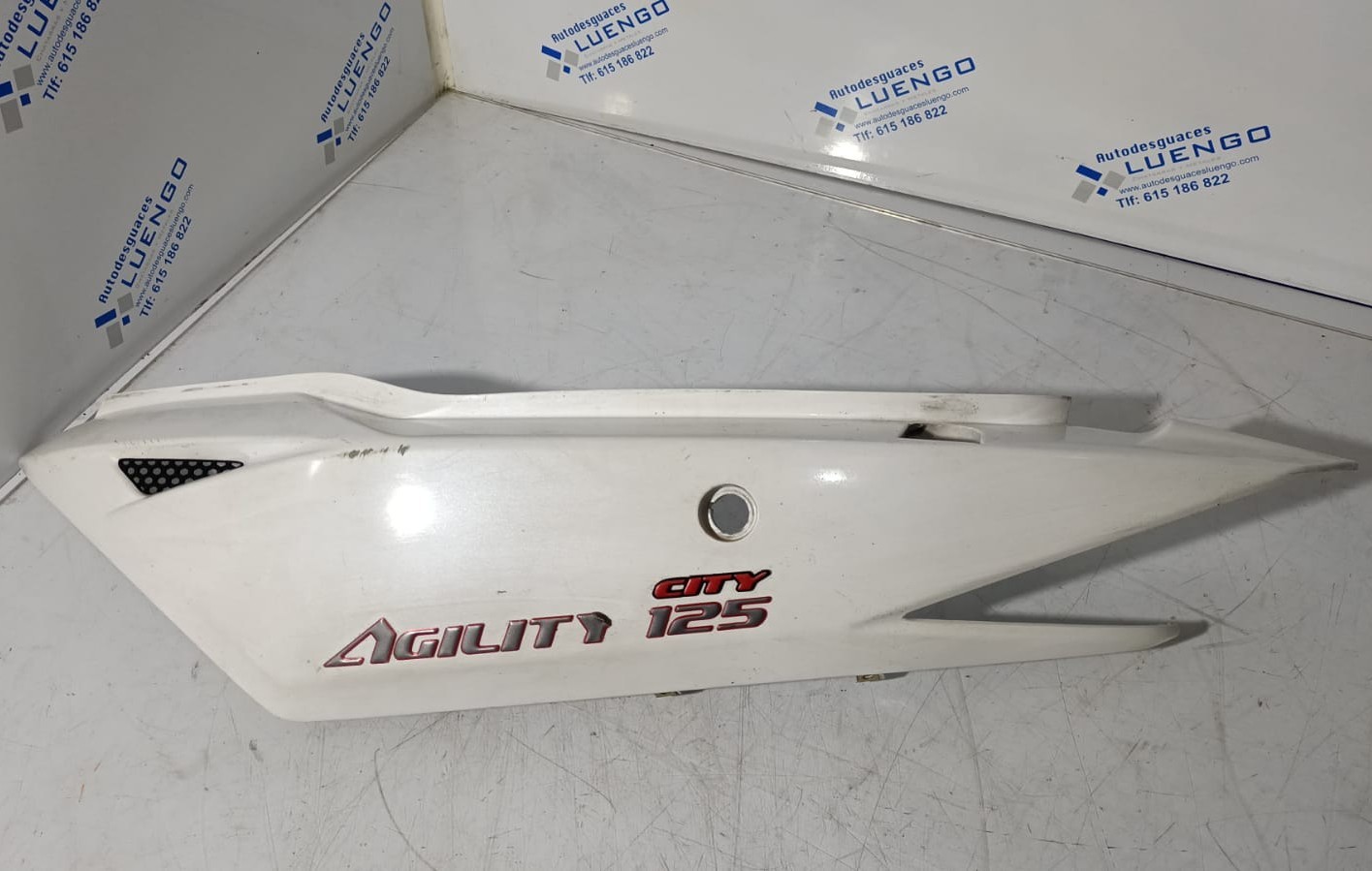Lateral trasero izquierdo Kymco Agility City 125 Carburación 2016