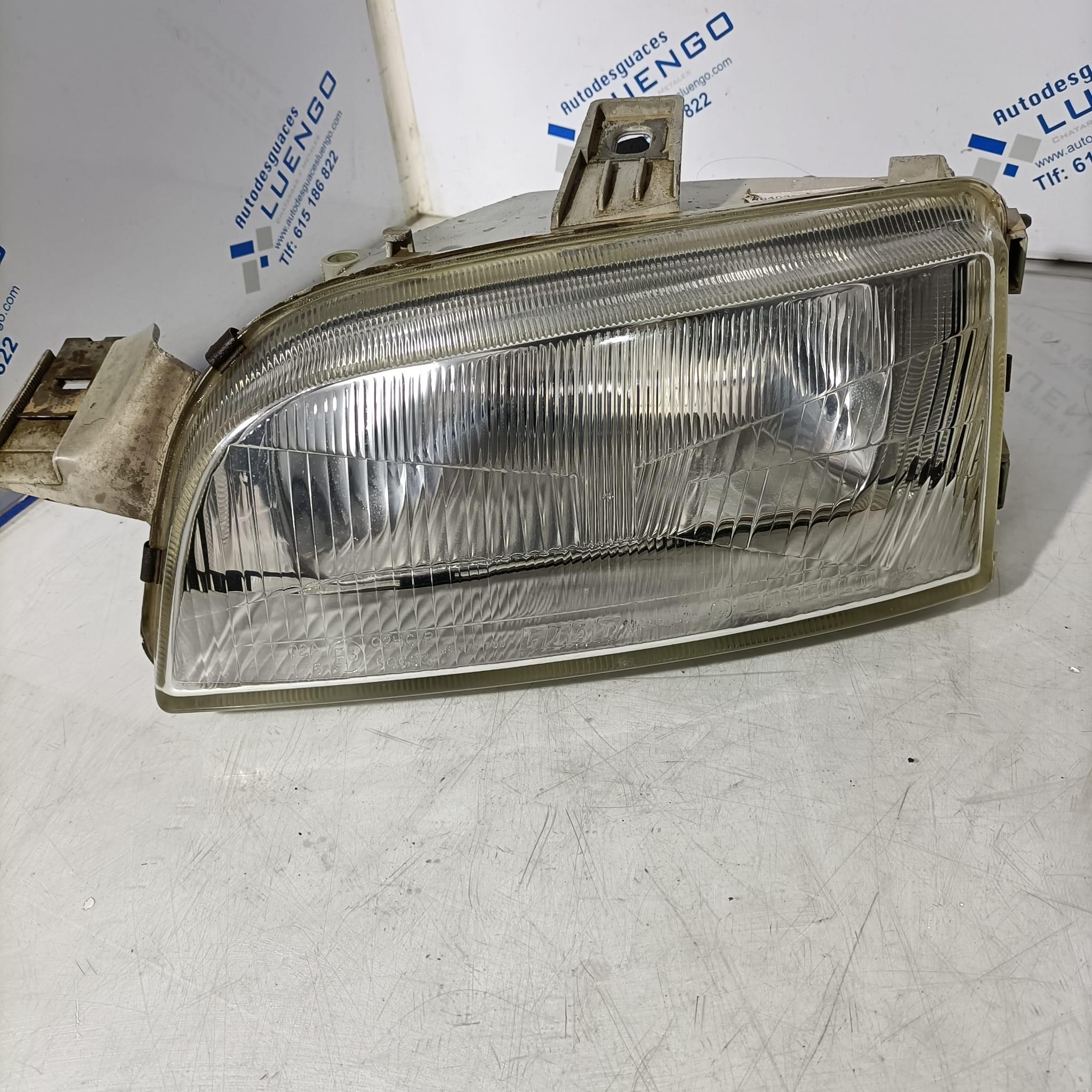 Faro delantero derecho Fiat Punto 1996
