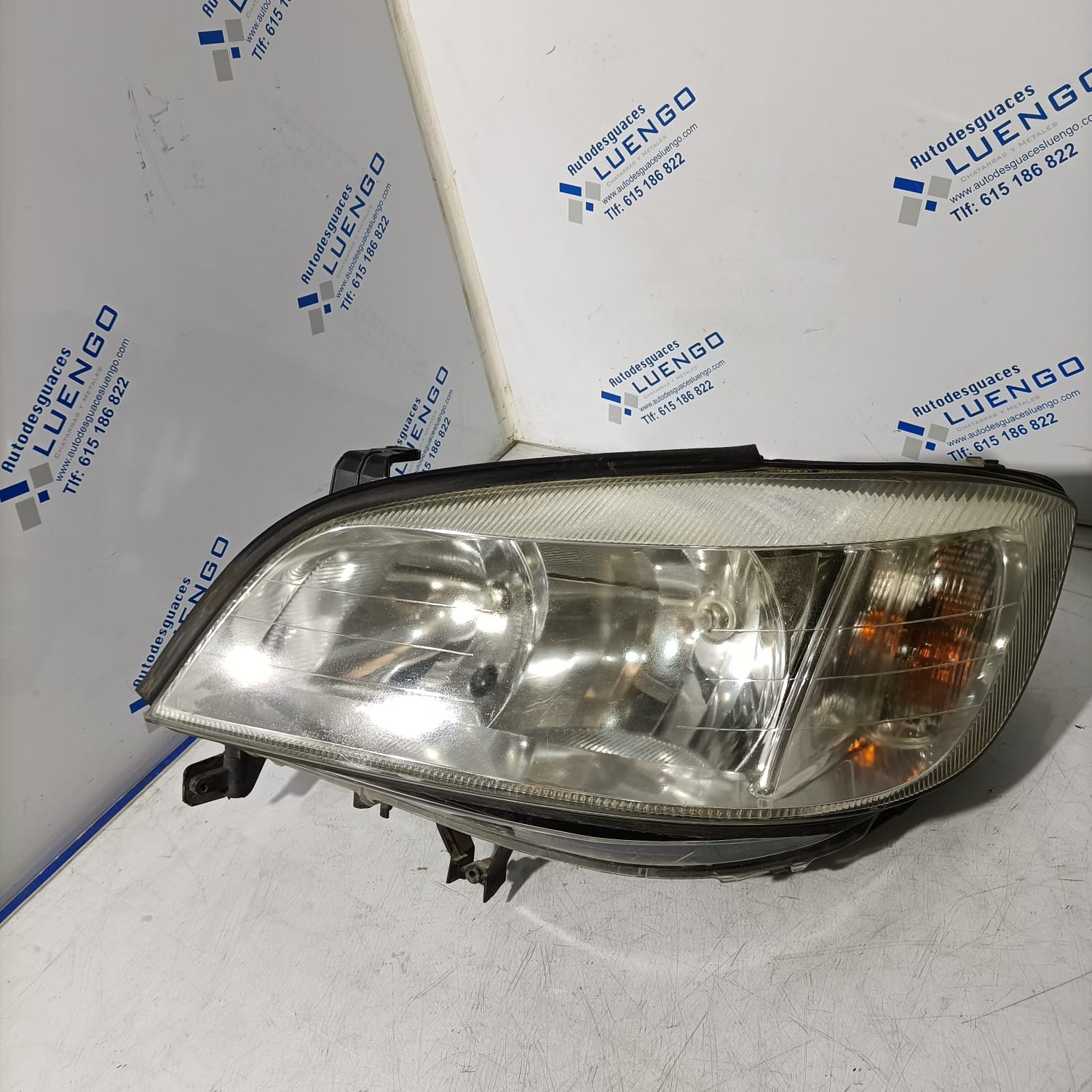 Faro delantero izquierdo Opel Zafira 2004
