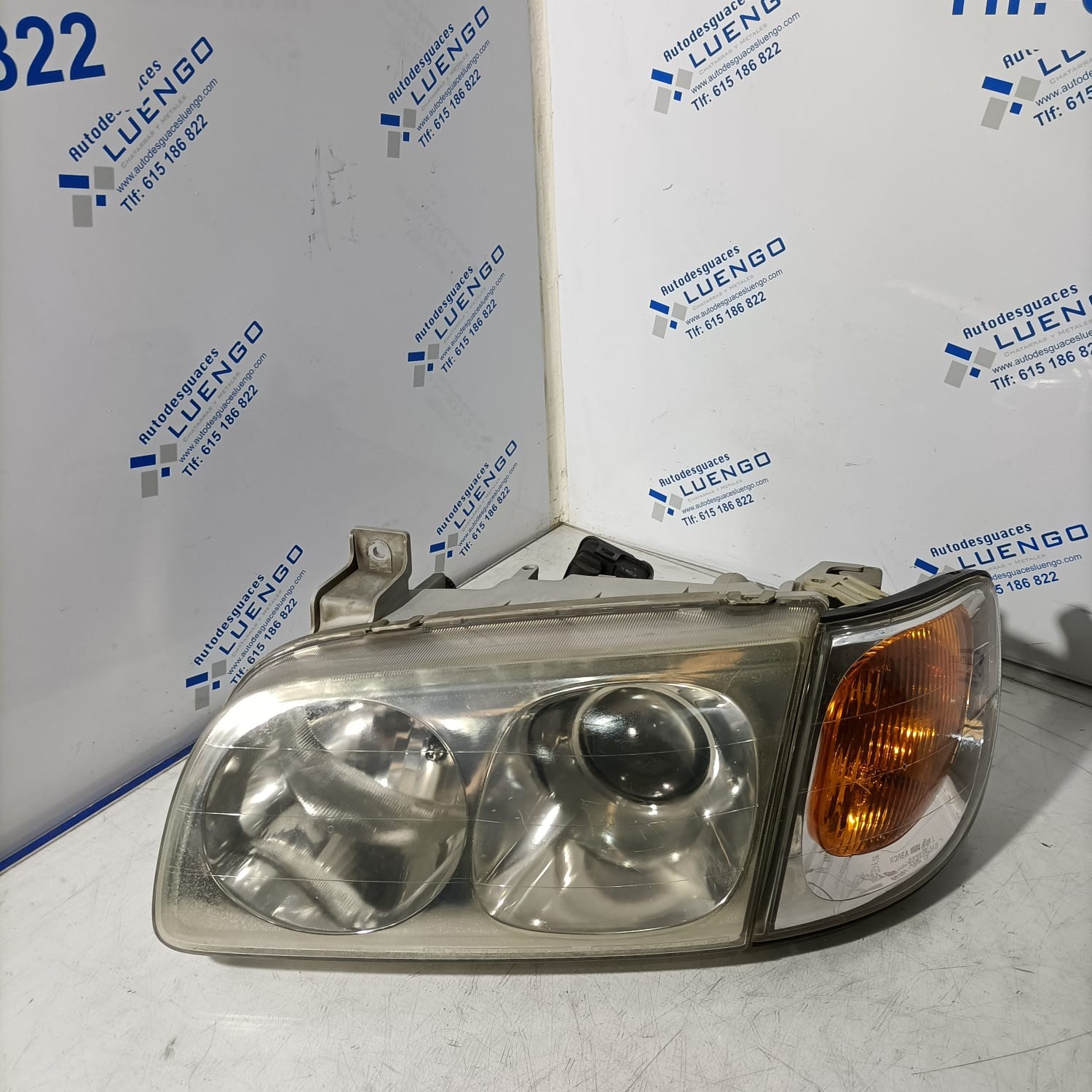 Faro delantero izquierdo Hyundai Trajet 2003