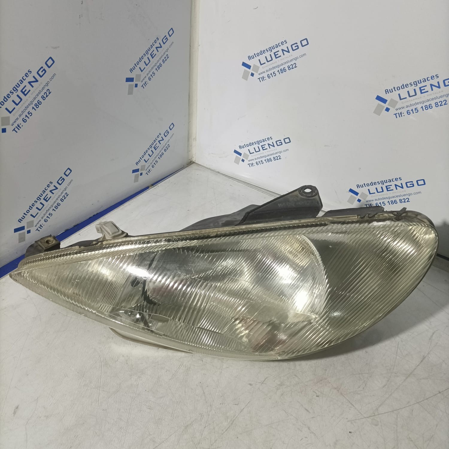 Faro delantero izquierdo Peugeot 206 2001